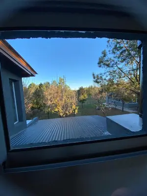 a view through a window of a roof at Cuatro vientos 2 in Santa Rosa de Calamuchita