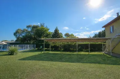 a soccer field with a net in a yard at Complejo BETELGEUSE in La Estancia