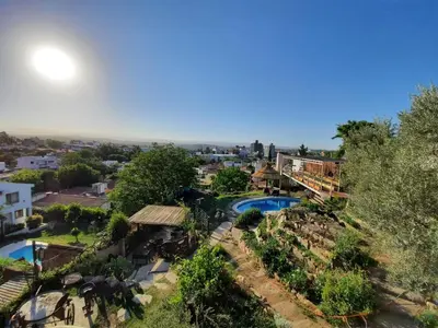 an aerial view of a villa with a swimming pool at El fogón de los amigos in Villa Carlos Paz