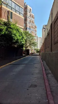 an empty street in a city with tall buildings at Exclusivo depto en Complejo Santo Domingo con seguridad 24 hs in Cordoba