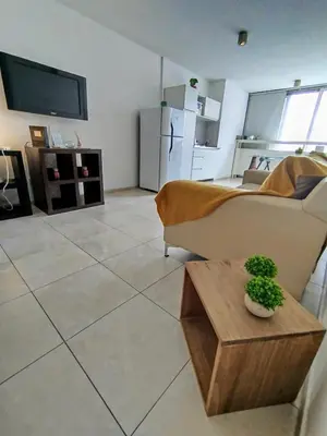 a living room with a couch and a table at Monoambiente excelente ubicación Cordoba Rent in Cordoba