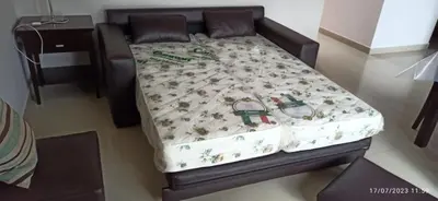 a model of a bed with a blanket on it at Paraíso Serrano 6 in Villa Ciudad Parque