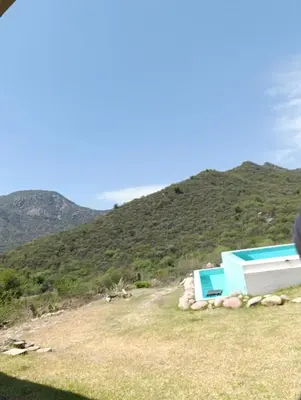 a house sitting on top of a hill at La Deseada in Quines