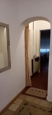 a hallway with an archway in a room at Departamento Alta Gracia in Alta Gracia