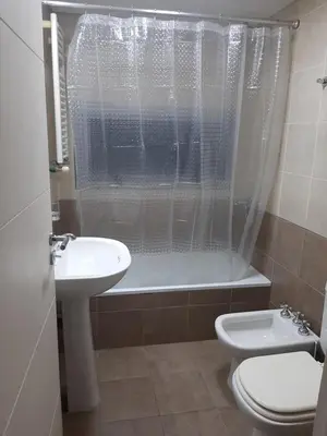 a bathroom with a sink and a toilet and a shower at Sonoma Ribera 5D in Cordoba