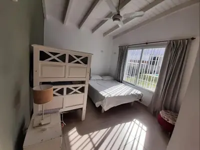 a bedroom with a bunk bed and a window at Mauro y Sonia in Estancia Vieja