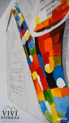 a close up of a painting on a piece of paper at Vivisierras, Duplex de categoría centro Carlos Paz vista frente al lago, 3 dormitorios, 2 baños, acceso inteligente in Villa Carlos Paz