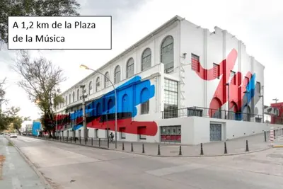 a building with a painting on the side of it at Departamento en el centro in Cordoba