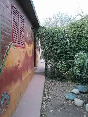a building with a window on the side of it at Casita en Los Hornillos in Los Hornillos