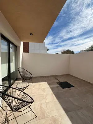 a room with two chairs and a sky at Depto 