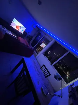 a view of a room with a blue light at Departamento PREMIUM Córdoba in Cordoba