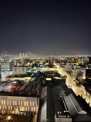 a view of a city at night with buildings at Departamento PREMIUM Córdoba in Cordoba