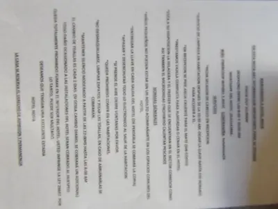 a book with black and white text on it at Nova Hotel Boutique in Villa Carlos Paz