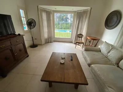 a living room with a couch and a coffee table at Casa RINCON DEL SOL in La Bolsa