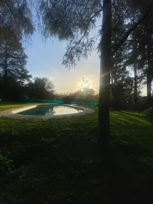 a small pond in the middle of a park at Casa RINCON DEL SOL in La Bolsa