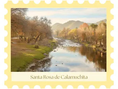 a picture of a river with trees and mountains at La Maga in Santa Rosa de Calamuchita