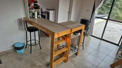 a wooden desk in a room with a window at La Maga in Santa Rosa de Calamuchita