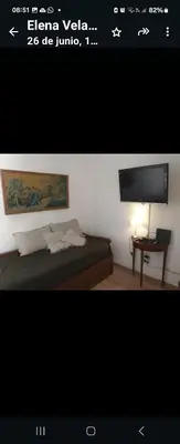 a picture of a bedroom with a bed and a tv at Center Córdoba Nize & Cozi in Cordoba