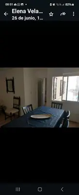 a picture of a living room with a table and chairs at Center Córdoba Nize & Cozi in Cordoba