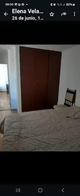 a picture of a bedroom with a bed and a closet at Center Córdoba Nize & Cozi in Cordoba
