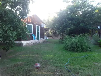 a soccer ball in the yard of a house at Cabañas La Fiaca in Los Manantiales