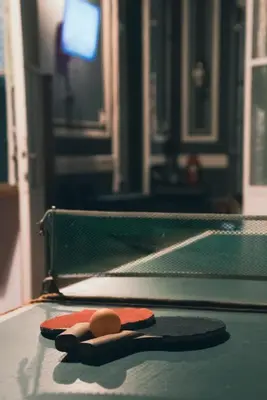 a pair of ping pong balls on top of a table at Hostel Alvear in Cordoba