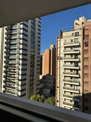 a view of some tall buildings in a city at Tránsito in Cordoba