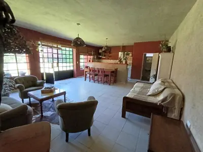 a living room with a couch and a table at Achaval-Torre in Cordoba