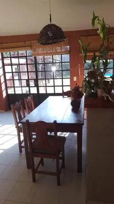 a dining room table and chairs in a kitchen at Achaval-Torre in Cordoba