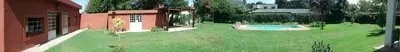 a large yard with a swimming pool in a house at Achaval-Torre in Cordoba