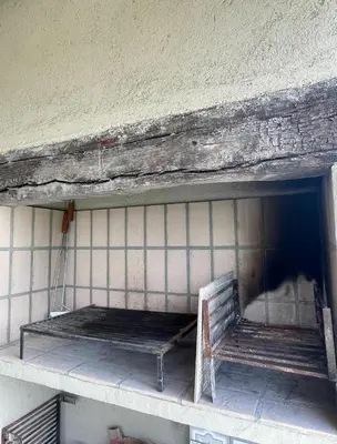 a bench sitting on a shelf in a building at Casa Reartes in Los Reartes
