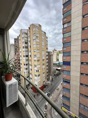 a balcony with a view of a city with tall buildings at Departamento Nueva Córdoba 7 A INVERHOME INMOBILIARIA in Cordoba