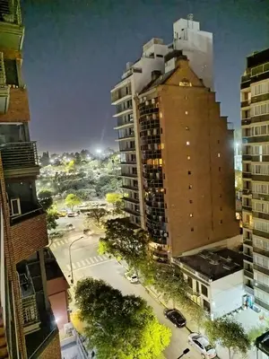 a view of a city at night with buildings at Obispo Oro Departamento Temporario Córdoba in Cordoba