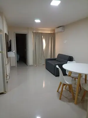 a living room with a couch and a table at Hermoso Departamento en muy bonita zona de Alta Córdoba, nuevo a estrenar in Cordoba