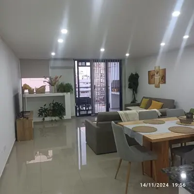 a living room with a couch and a table at CALASANz PREMIUM in Cordoba