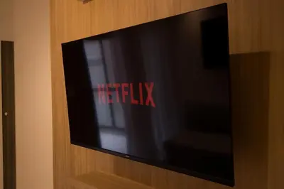 a television screen with the netflix logo on it at Departamento en Nueva Córdoba in Cordoba