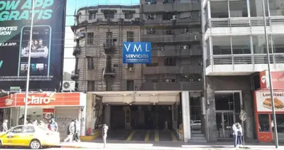 a building with a wii surveillance sign in front of it at Departamento Centrico Cordoba in Cordoba