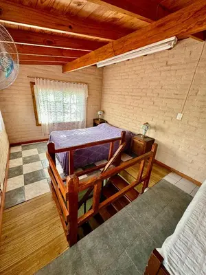 a bedroom with two bunk beds in a room at Cabañas Maranatha in El Rincón