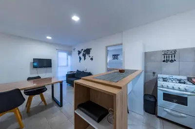 a kitchen with a counter and a stove top oven at Viaggiato Felix Frías in Cordoba
