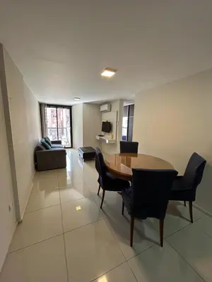 a living room with a table and chairs and a couch at Departamento -Peredo- 2 cuadras de plaza España-Cuidad universitaria By Apartcba in Cordoba