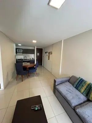 a living room with a couch and a table at Departamento -Peredo- 2 cuadras de plaza España-Cuidad universitaria By Apartcba in Cordoba