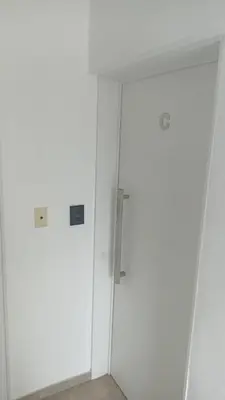 two white doors in a room with white walls at Atp Bolivia 164 in Cordoba