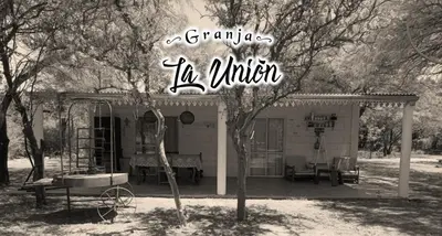 a gazebo in a park with a playground at Granja La Unión in Villa Dolores