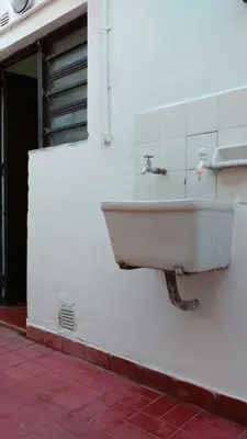 a sink on the side of a building at El Dpto de Gabicito II in Cordoba
