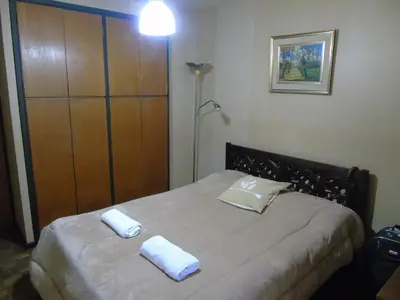 a bedroom with a bed with two white pillows on it at Córdoba Centro Gran Ubicación Gran Vista in Cordoba
