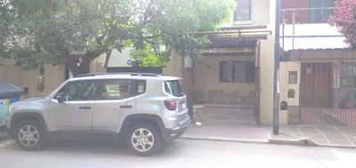 a silver suv parked in front of a house at La bien querida in Cordoba