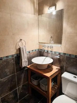a bathroom with a sink and a toilet at Casa Mona in Potrero de Garay