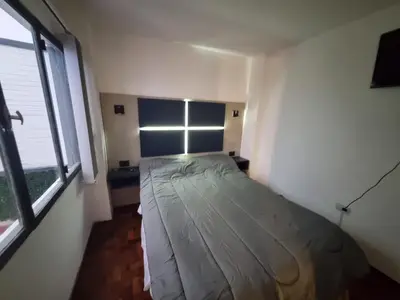 a small bedroom with a bed and a window at TREJO APART, A 40MTS DEL PATIO OLMOS, PLANTA BAJA in Cordoba