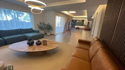 a living room with a couch and a table at Guesthouse Park in Cordoba
