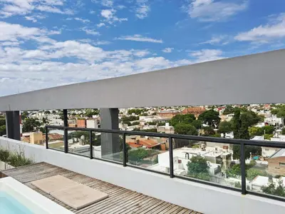 a balcony with a view of a city at Depto 1 dormitorio totalmente equipado in Cordoba